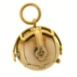 A GOLD AND SILVER MASONIC OPENING BALL CRUCIFORM PENDANT, MARKED UAW