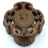 A CONTINENTAL CARVED WOOD HANGING JARDINIERE, DECORATED WITH MASKS OF THE SEASONS, 22CM H; 65 X 53CM