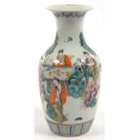 A CHINESE FAMILLE ROSE VASE, ENAMELLED WITH FIGURES AROUND A TABLE AND TWO BATS TO THE REVERSE,