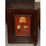 AN IRON SAFE WITH KEY, JOHN PORT MILL STREET ANCOTS MANCHESTER, 67CM H; 51 X 51CM