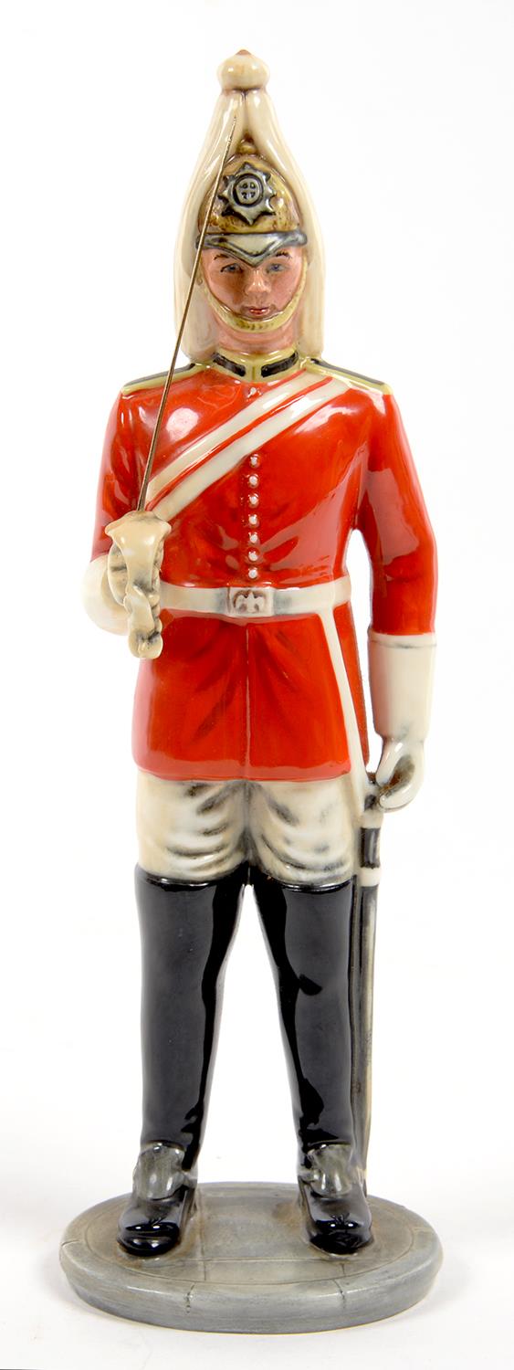 A ROYAL DOULTON BONE CHINA FIGURE OF THE LIFEGUARD, 25CM H, PRINTED MARK