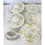 A ROYAL DOULTON TONKIN PATTERN DINNER SERVICE