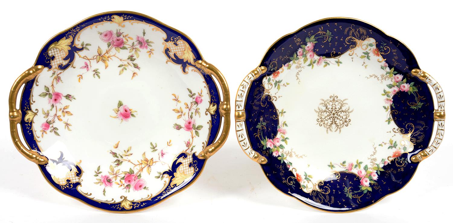 TWO COALPORT COBALT GROUND COMPORTS, DECORATED WITH ROSES, 24CM OVER HANDLES, PRINTED MARK, LATE - Image 2 of 2