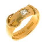 A DIAMOND BUCKLE RING IN 18CT GOLD, BIRMINGHAM 1876, 9G, SIZE R