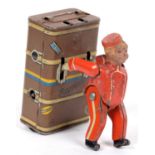 A PRE WAR GESCHA EXPRESS BOY LUGGAGE PORTER CLOCKWORK TINPLATE TOY, APPROXIMATELY 10CM H