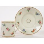 A CONTINENTAL EMPIRE PORCELAIN COFFEE CAN AND SAUCER, PROBABLY PARIS, PAINTED WITH A BOUQUET AND