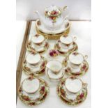 A ROYAL ALBERT OLD COUNTRY ROSES PATTERN TEA SERVICE, SET OF SIX DINNER PLATES AND BARROW OF FLOWERS