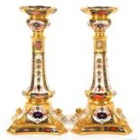 A PAIR OF ROYAL CROWN DERBY IMARI PATTERN DOLPHIN CANDLESTICKS, 27CM H, PRINTED MARK, BOXED