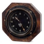 A SMITH'S DASHBOARD CLOCK WITH BLACK DIAL, WHITE CHAPTERS AND HANDS, BEZEL 8.5CM H, MOUNTED IN