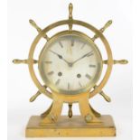 A 19TH C BRASS SHIP'S WHEEL NOVELTY MANTEL CLOCK, WITH SILVERED DIAL AND BLUED STEEL HANDS, GERMAN