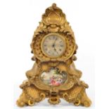 A FRENCH ORMOLU MANTEL CLOCK IN LOUIS XV STYLE, WITH SILVERED DIAL, THE APRON INSET WITH SEVRES