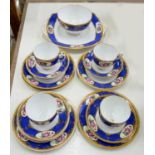 A ROYAL ALBERT BONE CHINA FLORAL TEA SERVICE WITH BLUE BORDER, PRINTED MARK