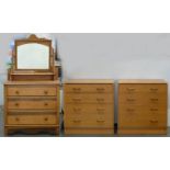 A PAIR OF G PLAN TEAK CHEST OF DRAWERS, ONE WITH SECRETAIRE, 85CM H; 76 X 44CM AND A WAXED PINE