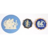 TWO WEDGWOOD JASPER WARE CAMEOS, ONE SET IN A GOLD BROOCH AND A LARGER WEDGWOOD SOLID BLUE JASPER