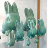 EIGHT DENBY ANTIQUE GREEN DANESBY WARE MODELS OF THE RABBITS MARMADUKE AND COTTONTAIL, 3.5 - 25CM H,