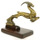 AN ART DECO BRONZE LEAPING GAZELLE MASCOT ON WOOD STAND, 13CM H