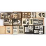 PHOTOGRAPHS. A  ROYAL AIR FORCE OFFICER'S ALBUM OF SNAPSHOTS AND POSTCARD FORMAT PHOTOGRAPHS OF