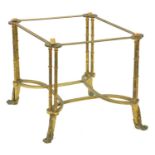 AN EMPIRE STYLE GILT BRASS TABLE BASE, 46CM H X 67CM W, FORMERLY WITH GLASS TOP