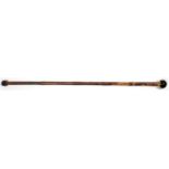 A BAMBOO CANE WITH GLOBULAR GILTMETAL MOUNTED HARDSTONE POMMEL, 80CM L