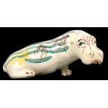 A C. H. BRANNAN SLIP WARE MODEL OF AN HIPPOPOTAMUS WITH PAINTED DECORATION, 25CM L, BLACK PRINTED