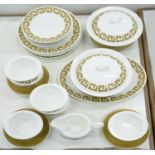 A WEDGWOOD BONE CHINA OLD GOLD KEYSTONE PATTERN DINNER SERVICE DESIGNED BY SUSIE COPPER, PRINTED