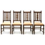 A SET OF FOUR CARVED AND TURNED OAK DINING CHAIRS, C1930