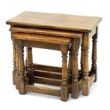 A JOINTED OAK NEST OF TABLES, 48CM H X 60CM W AND SMALLER