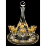 A CONTINENTAL GILT GLASS LIQUEUR SET, DECANTER AND STOPPER 24CM H, EARLY 20TH C