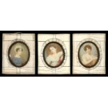 THREE DECORATIVE PORTRAIT MINIATURES OF YOUNG WOMEN IN IVORY VENEERED FRAMES, 14CM OVERALL, EARLY
