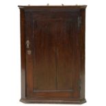 A GEORGE III OAK CORNER CUPBOARD, 103CM H X 69CM W, A GEORGE III OAK CORNER CUPBOARD WITH PANELLED