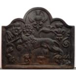 A VICTORIAN CAST IRON FIRE BACK, WITH LION, ROSE, THISTLE AND FLEUR-DE-LIS, 67 X 78CM W