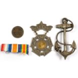 A COPPER TOKEN OF H CHAMBERLIN SONS AND CO DRAPERS 1847, A VICTORIAN SILVER ANCHOR BROOCH AND A