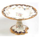 A ROYAL CROWN DERBY COMPORT WITH LIGHTLY MOULDED COBALT AND GILT BORDER AND DECORATED WITH FESTOONS,