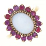 AN OPAL AND RUBY CLUSTER RING IN 9CT GOLD, LONDON 1975, 5G, SIZE L ½