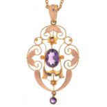 AN ART NOUVEAU AMETHYST PENDANT IN GOLD MARKED 9CT, ON GOLD CHAIN, 5G