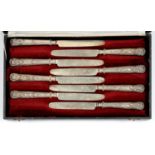 A SET OF SIXTEEN GEORGE IV SILVER DESSERT KNIVES AND FORKS, BY AARON HADFIELD & SONS, SHEFFIELD