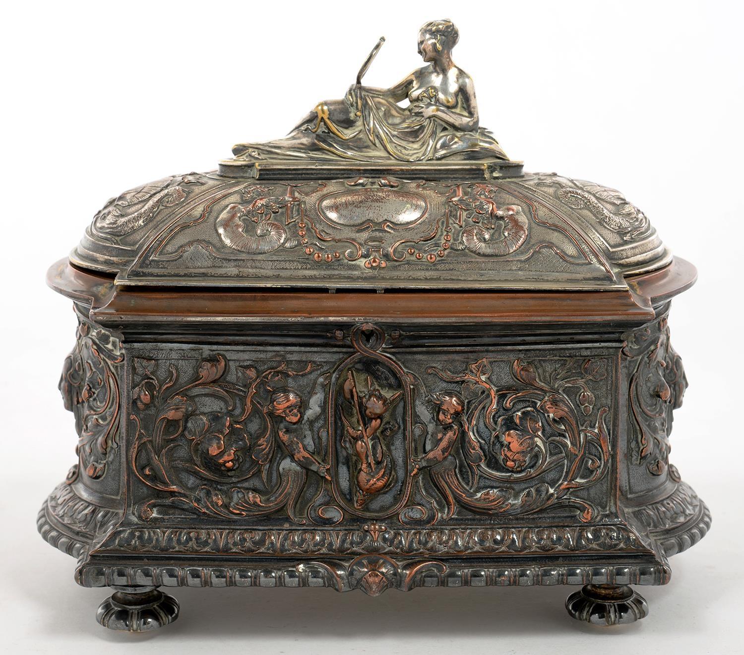 A VICTORIAN ELECTROPLATED COPPER ELECTROTYPE CASKET OF ORNATE BOW ENDED FORM, THE DOMED LID
