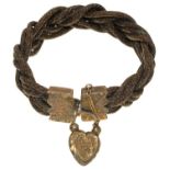 A VICTORIAN PLAITED HAIR MOURNING BRACELET WITH INSCRIBED SILVER GILT CLASP