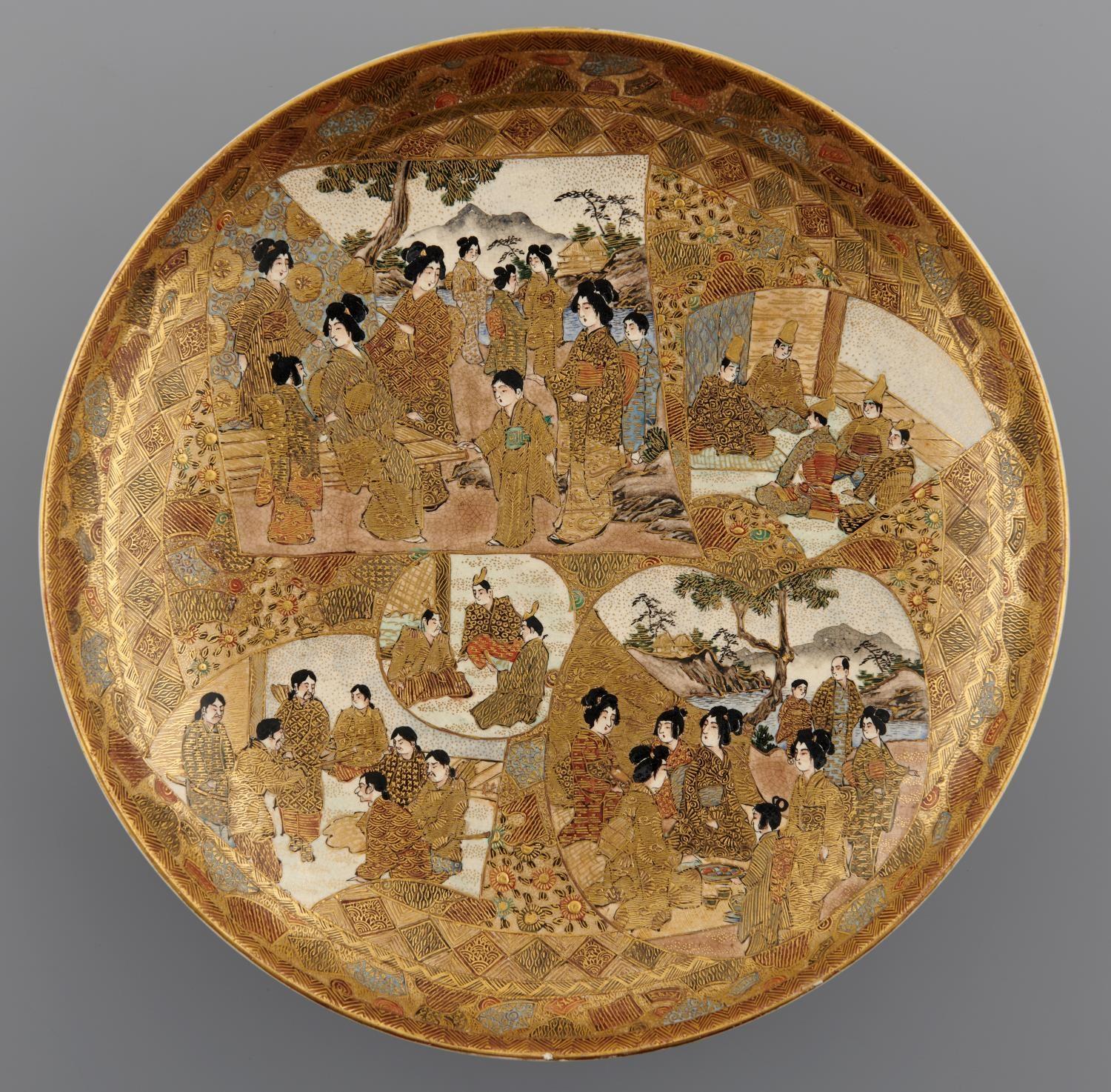A JAPANESE SATSUMA EARTHENWARE DISH, MEIJI PERIOD  decorated with fan shaped panels of dignitaries