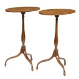 A PAIR OF GEORGE III SLENDER MAHOGANY  TRIPOD TABLES, LATE 18th C  the oval top on hexagonal