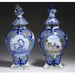 TWO DUTCH DELFTWARE POLYCHROME VASES AND COVERS, 19TH C  one painted with a woman riding on a
