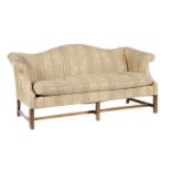A 'CHINESE CHIPPENDALE' REVIVAL  MAHOGANY SOFA, EARLY 20TH C  on blind fret carved legs, cushions,