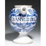 A LONDON DELFTWARE WET DRUG JAR, C1720  of gobular shape, painted in blue with a strapwork label