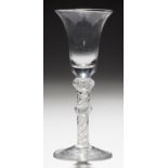 AN ENGLISH WINE GLASS, C1770-80 the bell bowl on double series opaque twist stem with shoulder and