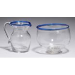 AN ENGLISH GLASS CREAM JUG AND SUGAR BOWL WITH APPLIED BLUE GLASS RIM, C1780   sharp pontil mark,
