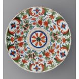 A BRISTOL DELFTWARE 'BLUE, RED, GREEN' DISH, C1760 painted with a stylised geometric floral pattern,