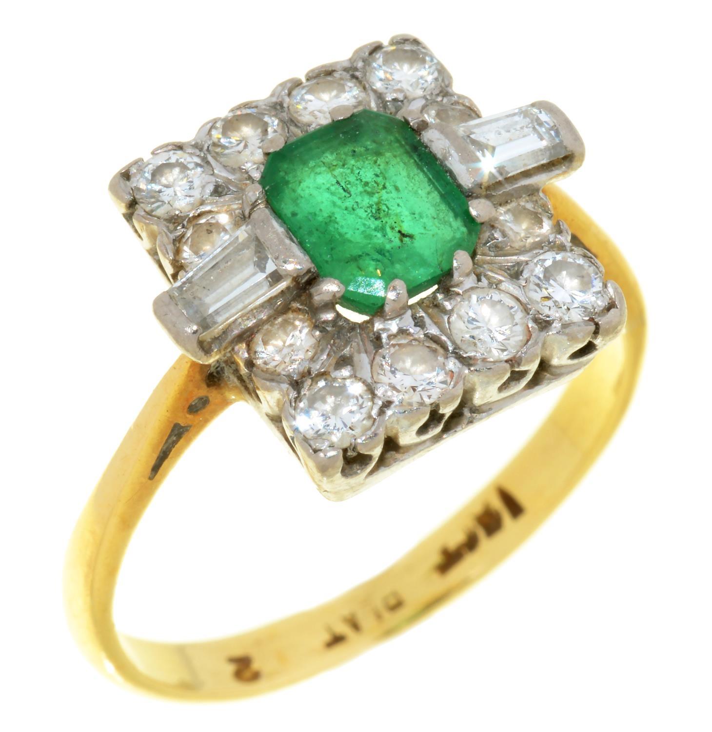 AN EMERALD AND DIAMOND CLUSTER RING gold hoop, marked 18ct and platinum, 4.5g, size N ½ Light