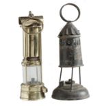A VICTORIAN TINPLATE HAND LANTERN, SECOND HALF 19TH C AND A BRASS 3 BAR MINER'S SAFETY LAMP, MUSELER