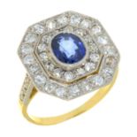 A SAPPHIRE AND DIAMOND CLUSTER RING in gold, the central sapphire approx 6 x 5 mm, unmarked, 6g,