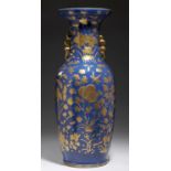 A CANTON FAMILLE ROSE MOULDED BLUE GROUND GILT VASE, SECOND HALF 19TH C 63cm h Slight wear to